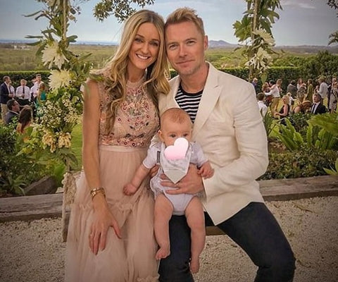 Storm & Ronan Keating use Neckerchew with their little one Cooper